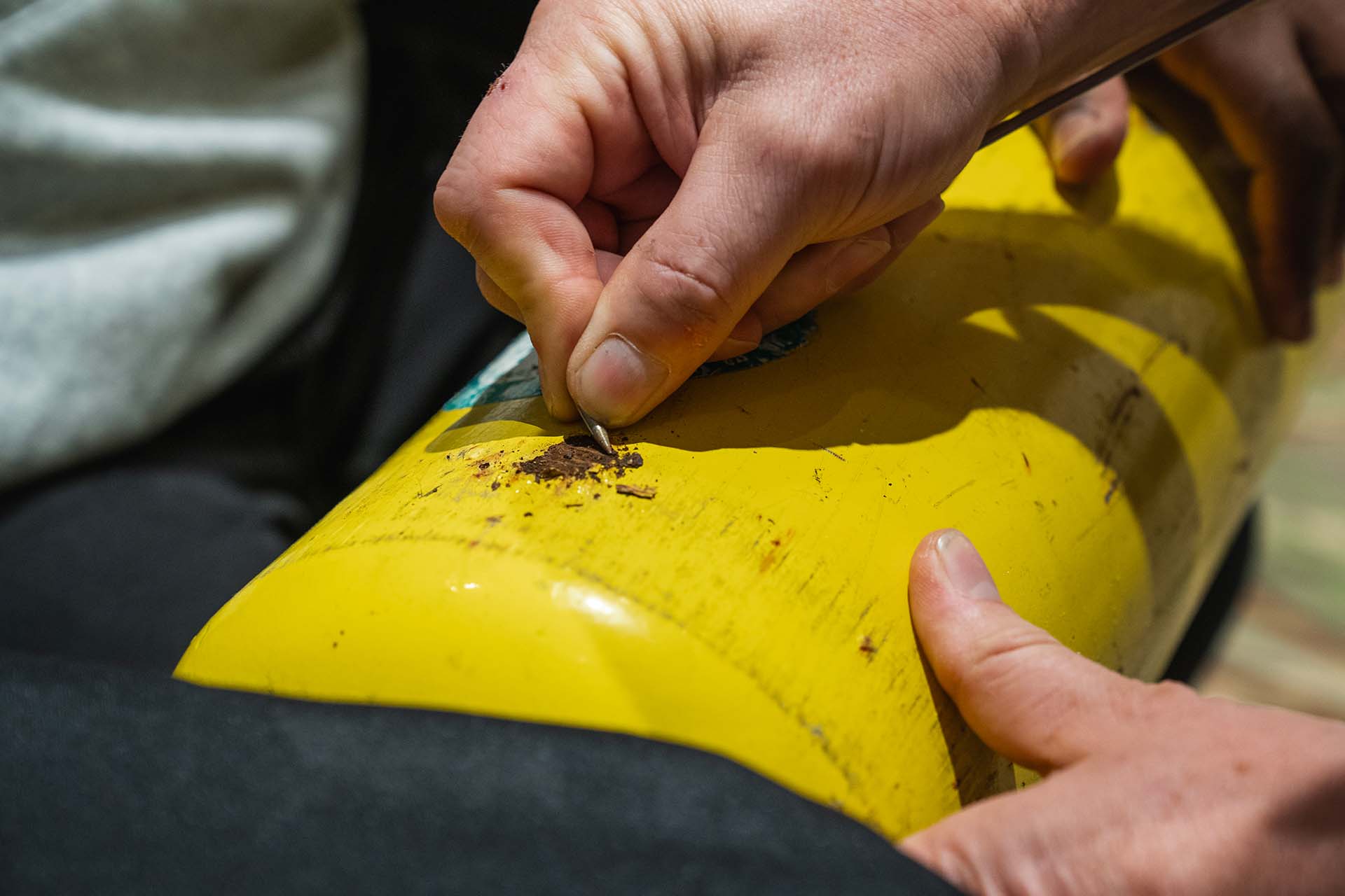 Cylinder Assessment Technician inspecting high-pressure cylinder during C.A.T. certification training